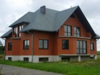 Кирпичный или деревянный дом